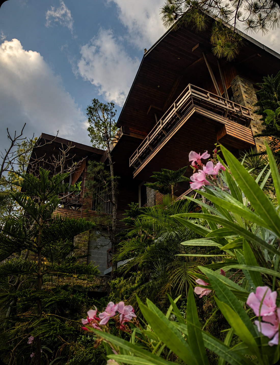 The wood and stone entrance of Hermitage Kasauli